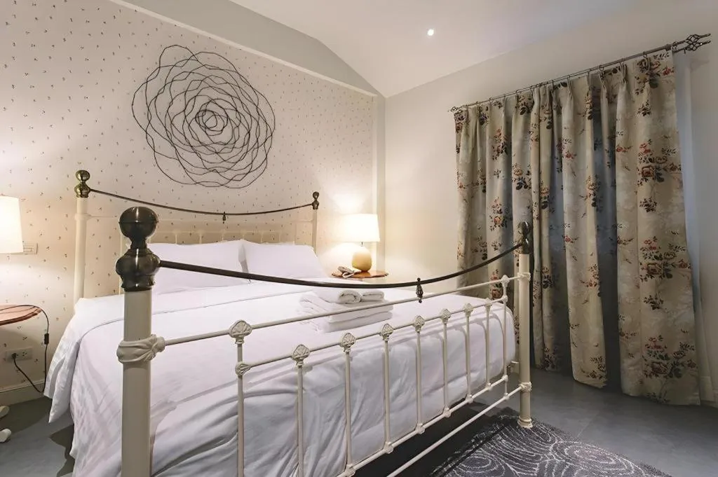 Bed in Verona Boutique Hotel - The Verona Co., Ltd