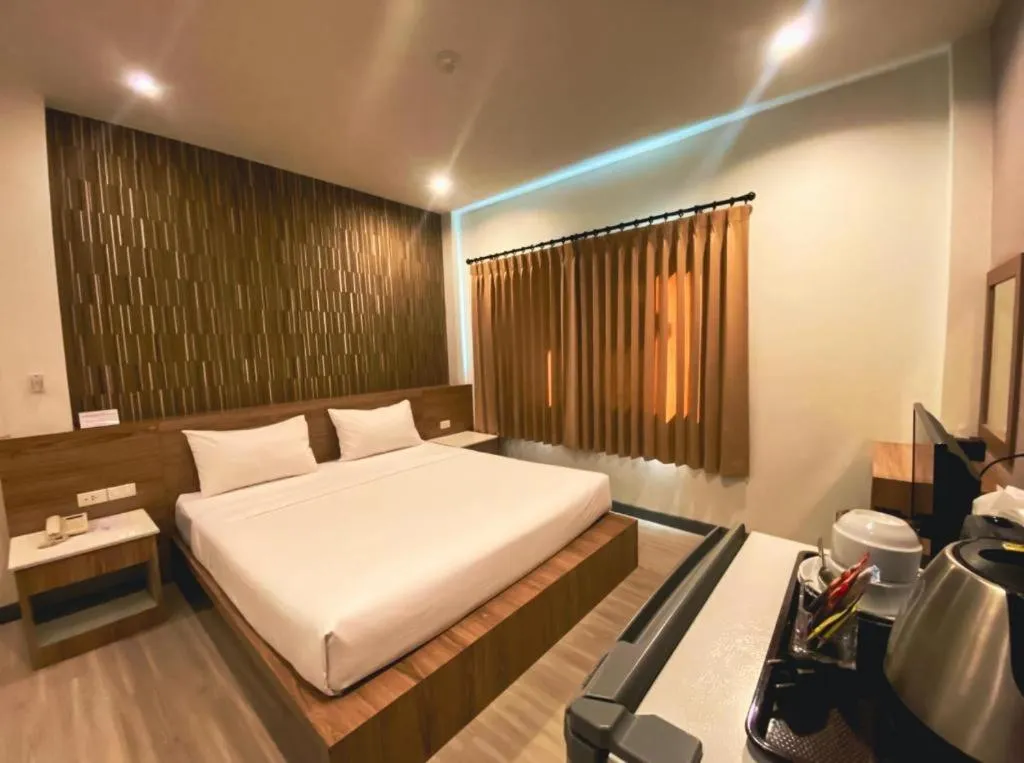 Bed in Seree Grand Resort