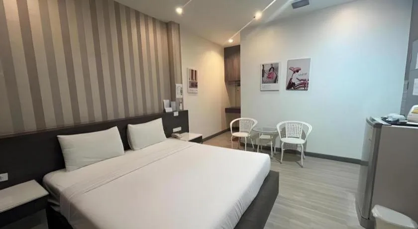 Bed in Seree Grand Resort