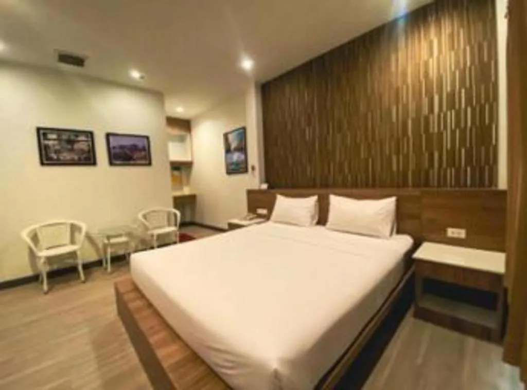 Bed in Seree Grand Resort