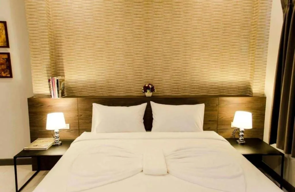 Bed in Seree Grand Resort