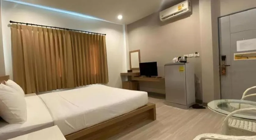 Bed in Seree Grand Resort