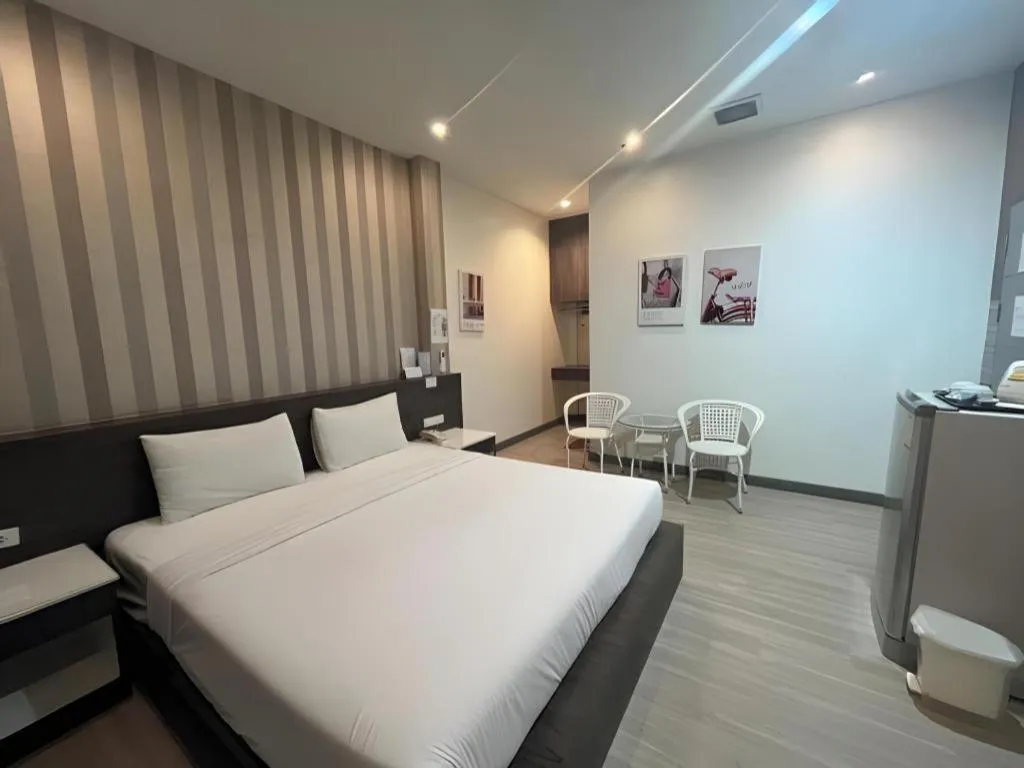 Bed in Seree Grand Resort