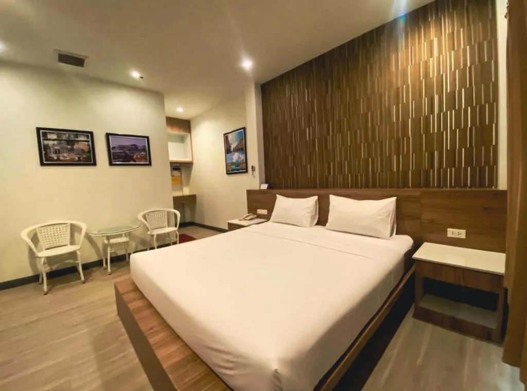 Bed in Seree Grand Resort