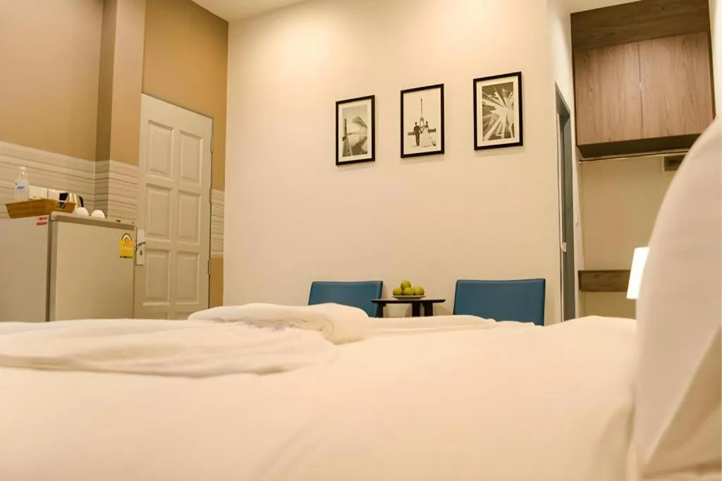 Bed in Seree Grand Resort