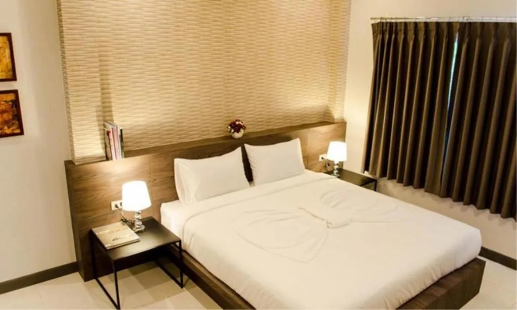 Bed in Seree Grand Resort