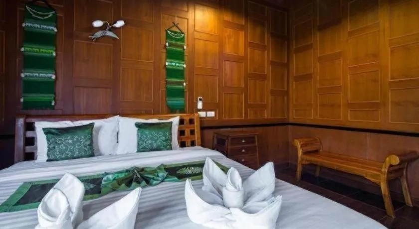 Bed in Baan Baitan Resort