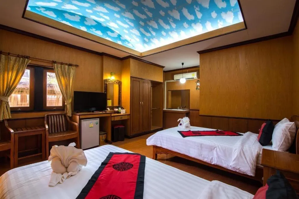 Bed in Baan Baitan Resort