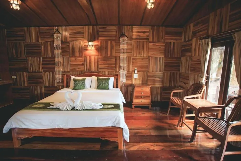 Bed in Baan Baitan Resort