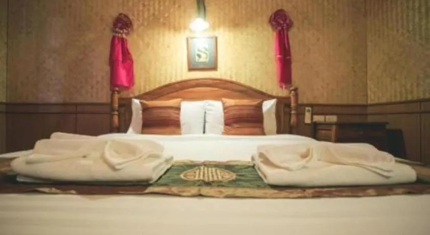 Bed in Baan Baitan Resort