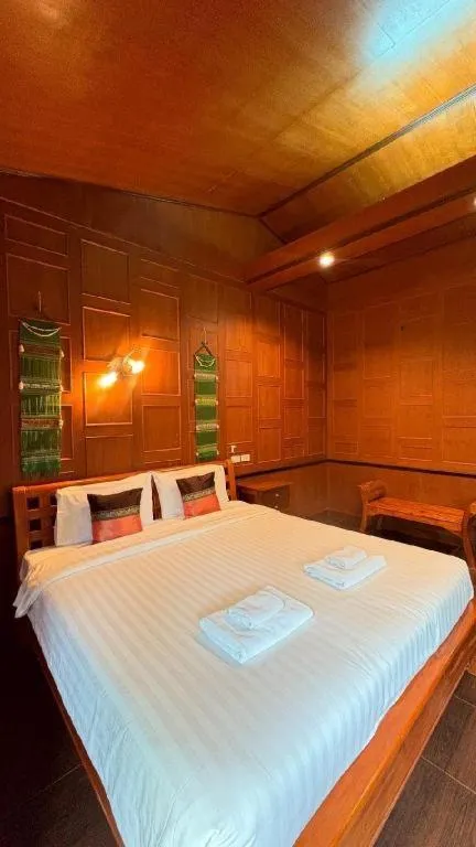 Bed in Baan Baitan Resort