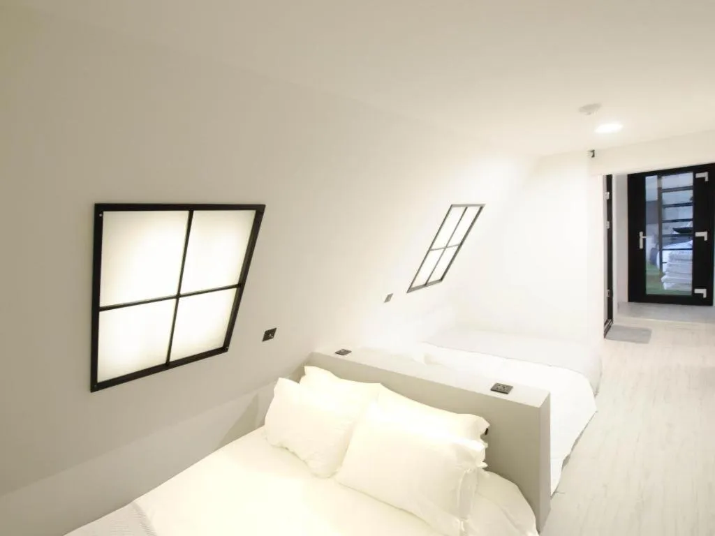 Bed in Mmmio II Design Residence Myeongdong