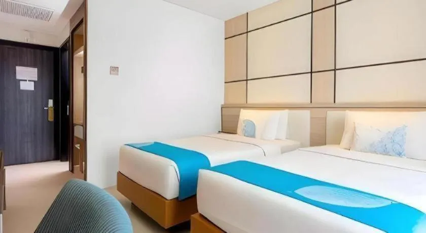 Bed in Java Lotus Hotel Jember