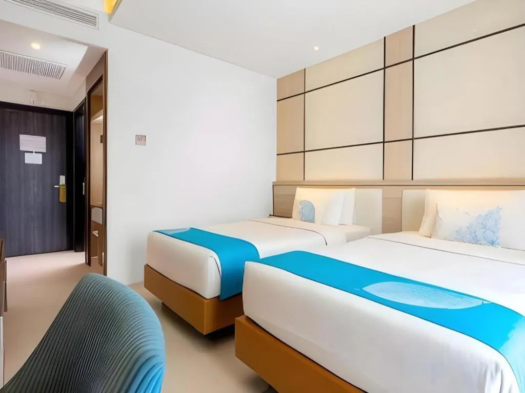 Bed in Java Lotus Hotel Jember