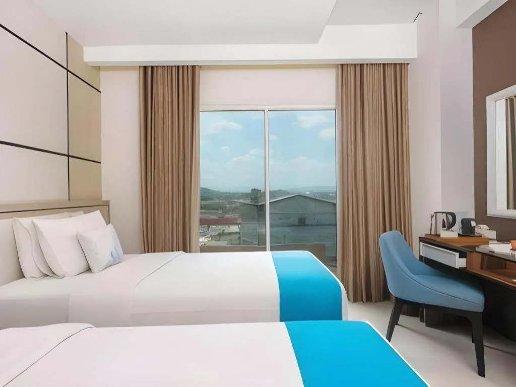 Bed in Java Lotus Hotel Jember