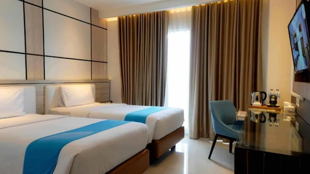 Bed in Java Lotus Hotel Jember