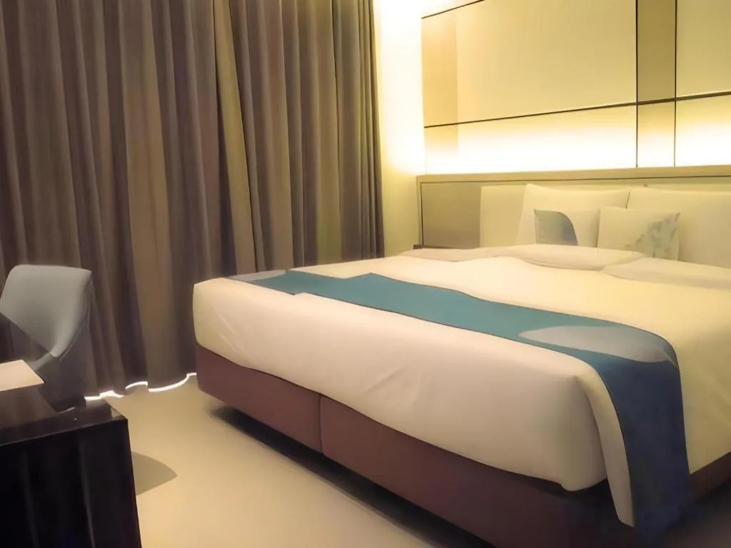 Bed in Java Lotus Hotel Jember