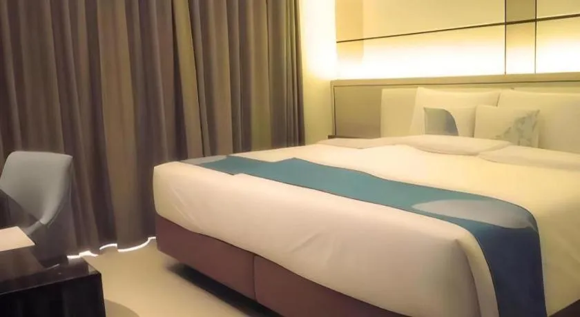 Bed in Java Lotus Hotel Jember