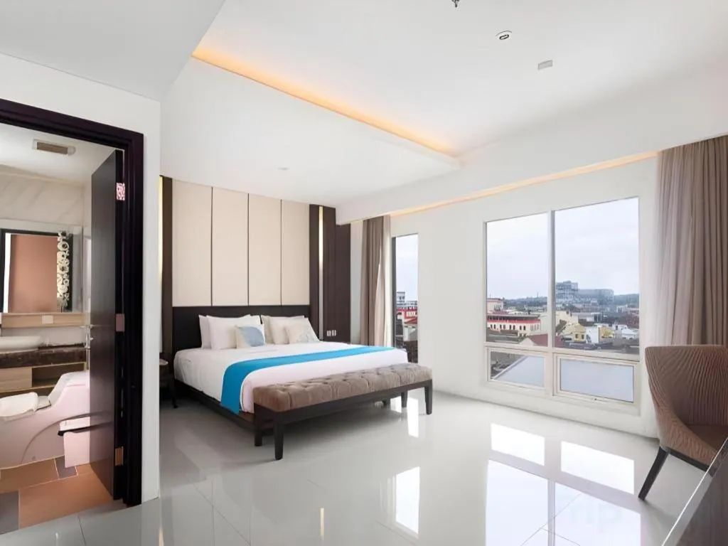 Bed in Java Lotus Hotel Jember