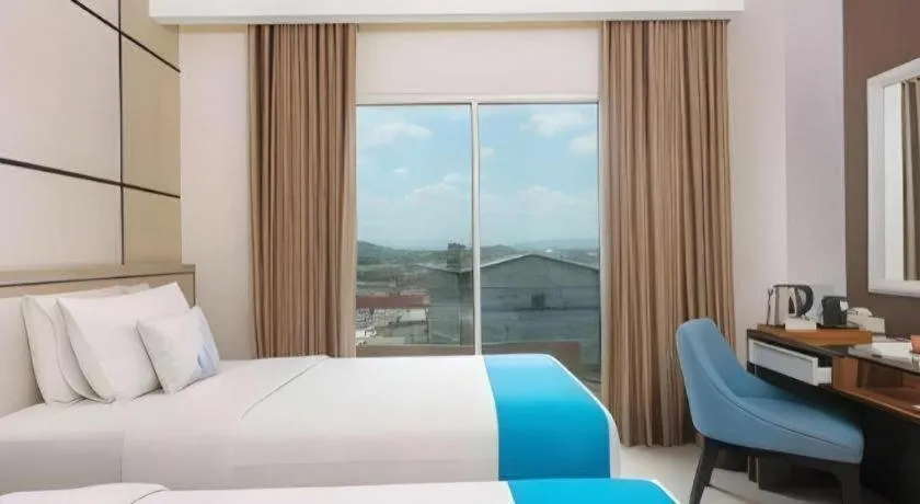 Bed in Java Lotus Hotel Jember