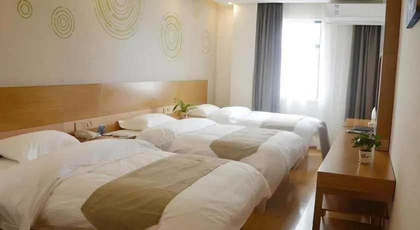 Bed in GreenTree Inn Anqing Wangjiang County Lantian Road Yiheyuan Express Hotel