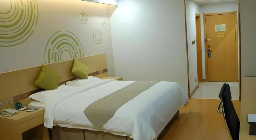 Bed in GreenTree Inn Anqing Wangjiang County Lantian Road Yiheyuan Express Hotel