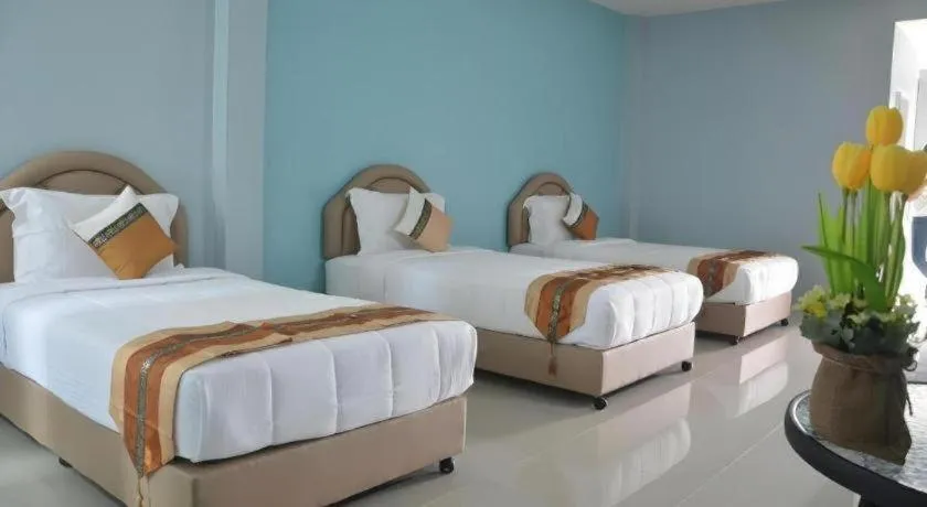 Bed in Satun Boutique Resort