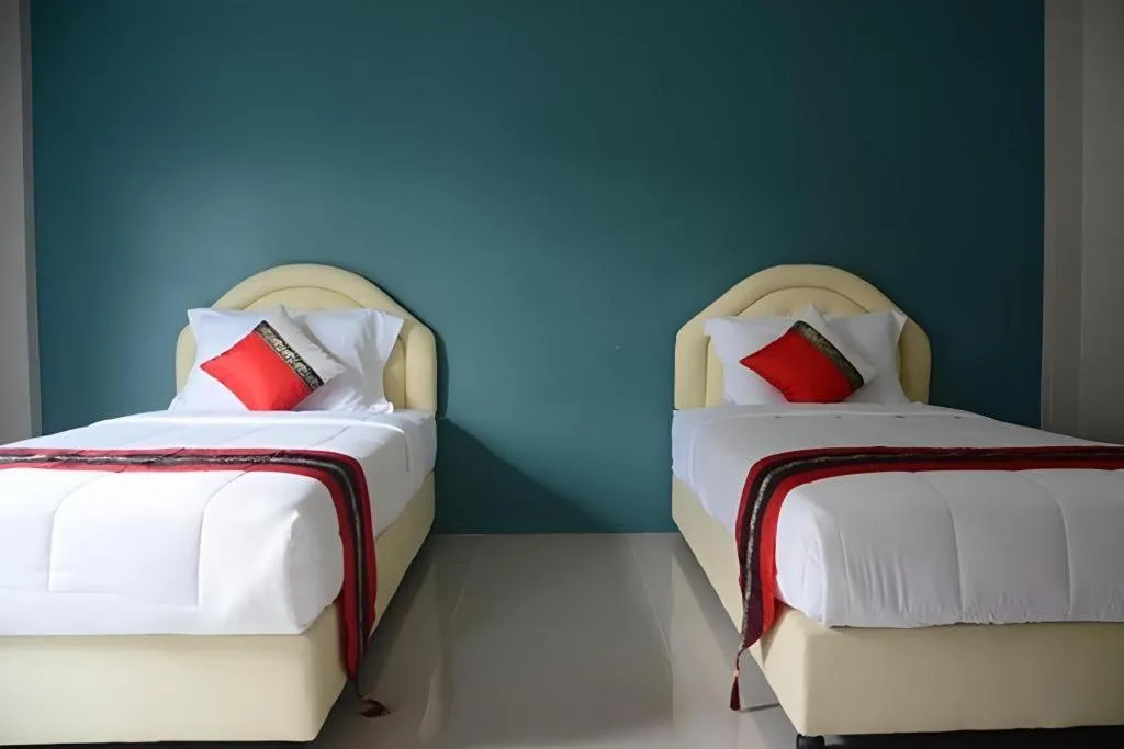 Bed in Satun Boutique Resort