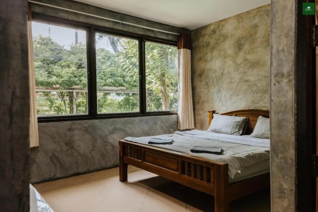 Bed in Pingview Villa Resort