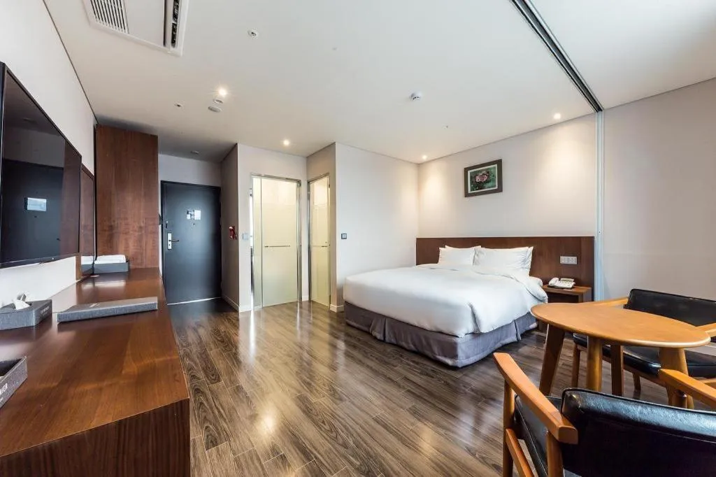 Bed in CS Premier Hotel