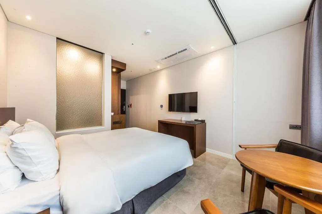 Bed in CS Premier Hotel