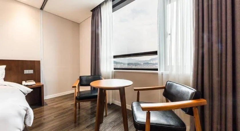 Bed in CS Premier Hotel