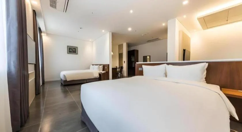 Bed in CS Premier Hotel