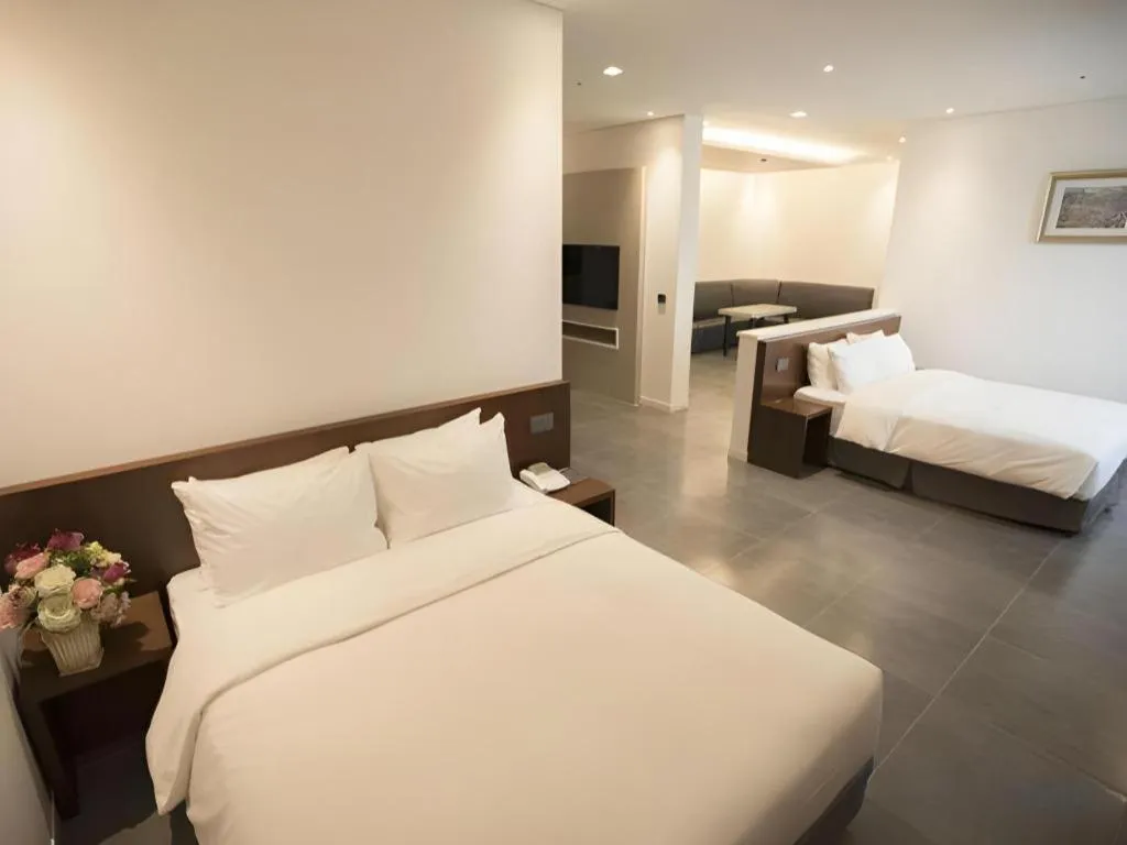 Bed in CS Premier Hotel