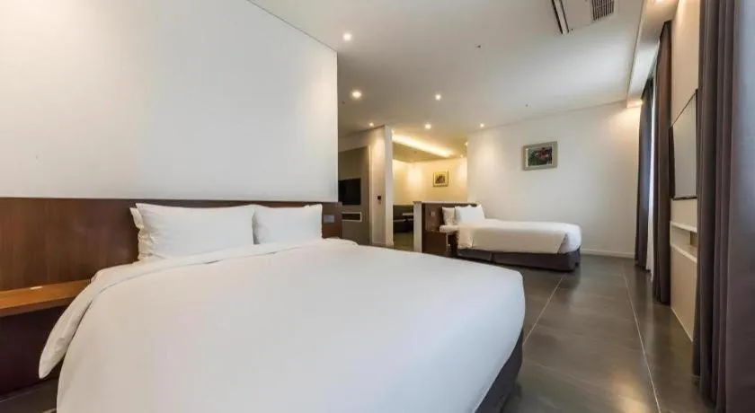 Bed in CS Premier Hotel