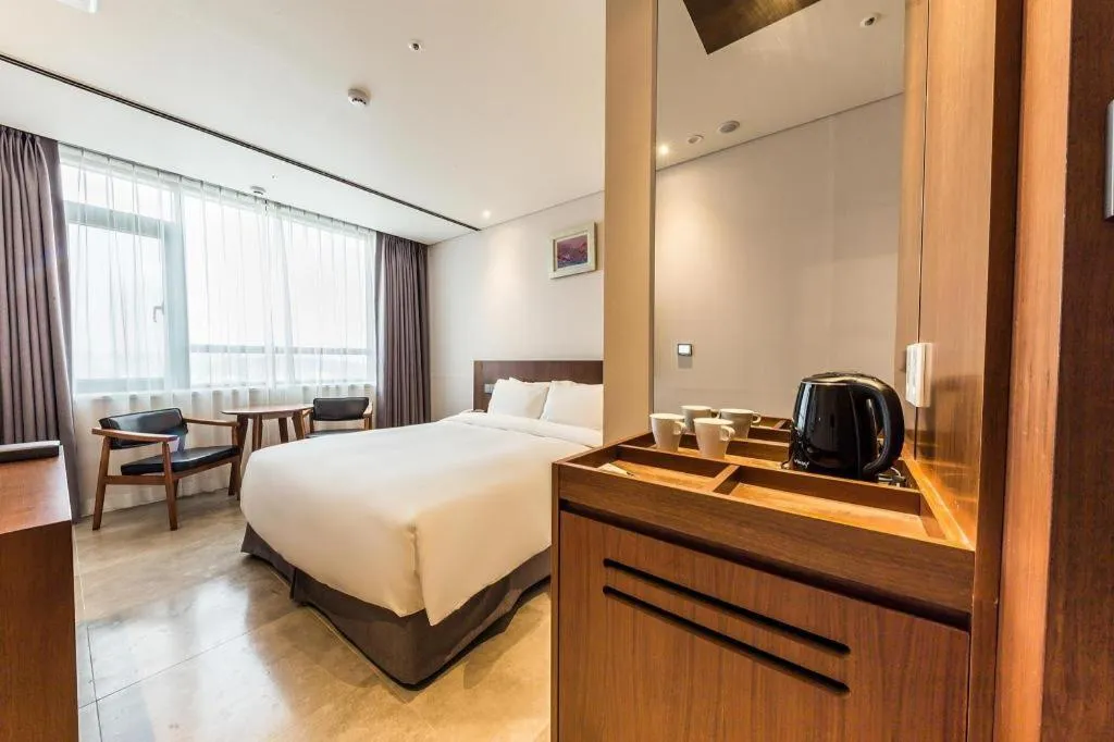 Bed in CS Premier Hotel