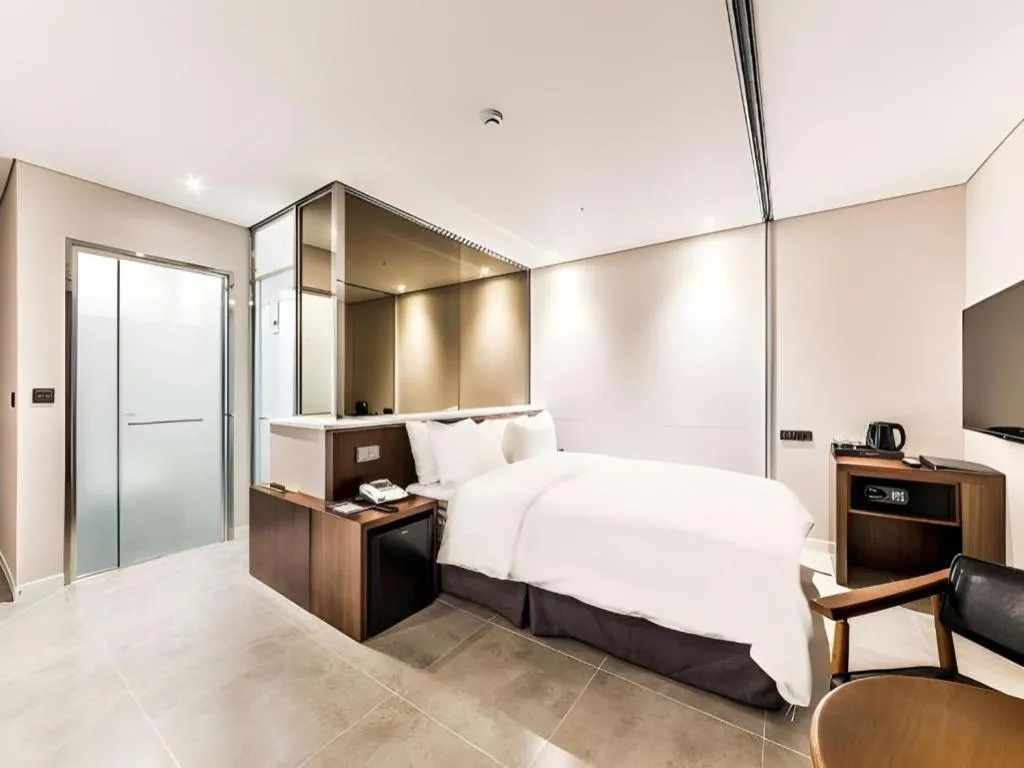 Bed in CS Premier Hotel