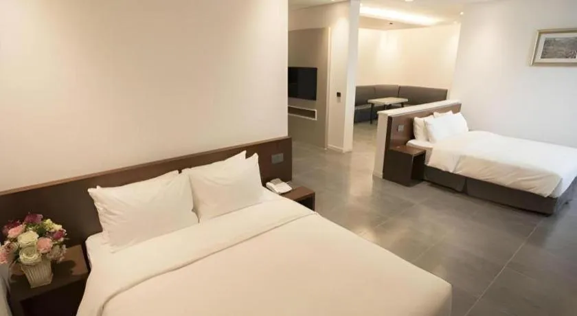 Bed in CS Premier Hotel