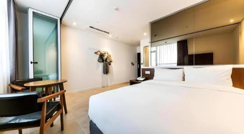 Bed in CS Premier Hotel