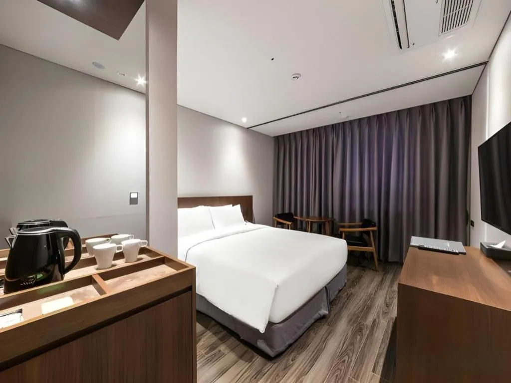 Bed in CS Premier Hotel