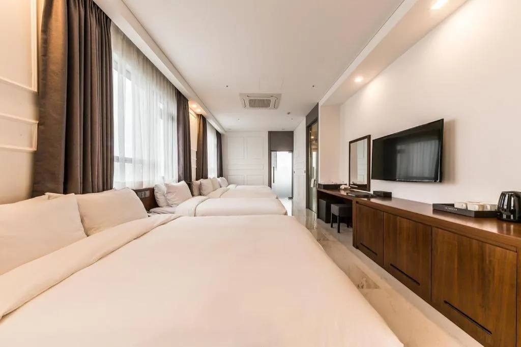 Bed in CS Premier Hotel