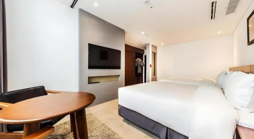 Bed in CS Premier Hotel