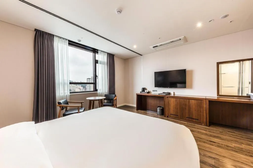 Bed in CS Premier Hotel