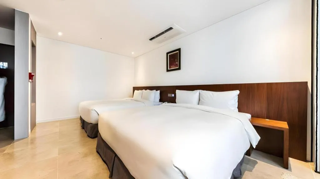 Bed in CS Premier Hotel