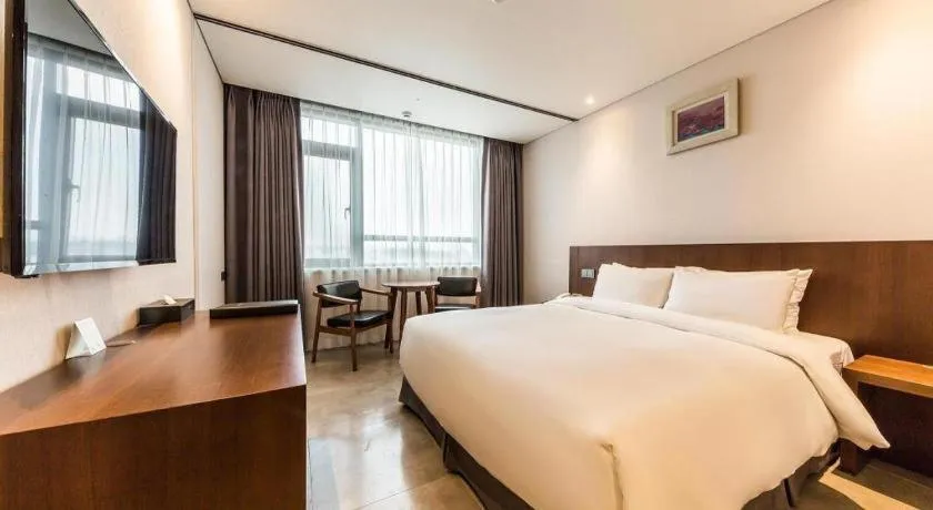 Bed in CS Premier Hotel