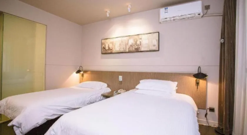 Bed in Jinjiang Inn Select Shenyang Tawan Xingshun Night Market Metro Station
