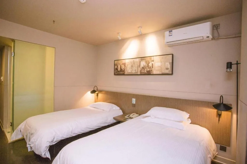 Bed in Jinjiang Inn Select Shenyang Tawan Xingshun Night Market Metro Station