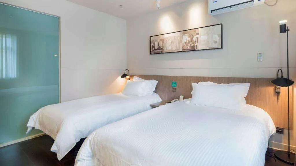 Bed in Jinjiang Inn Select Shenyang Tawan Xingshun Night Market Metro Station