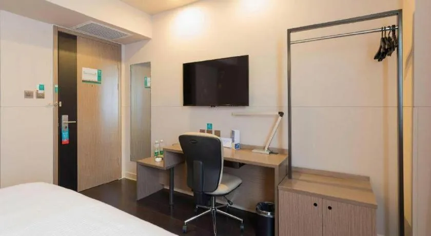 Bed in Jinjiang Inn Select Shenyang Tawan Xingshun Night Market Metro Station