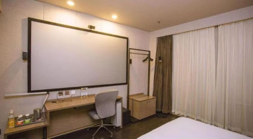 Bed in Jinjiang Inn Select Shenyang Tawan Xingshun Night Market Metro Station